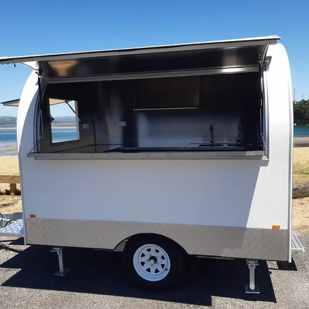 White Round-Top Food Trailer with Diamond Plate